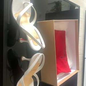 White Louboutin heels